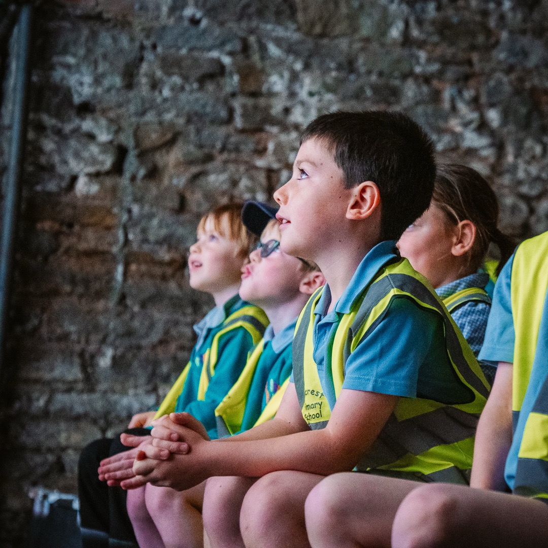 children looking at something out of the field of view
