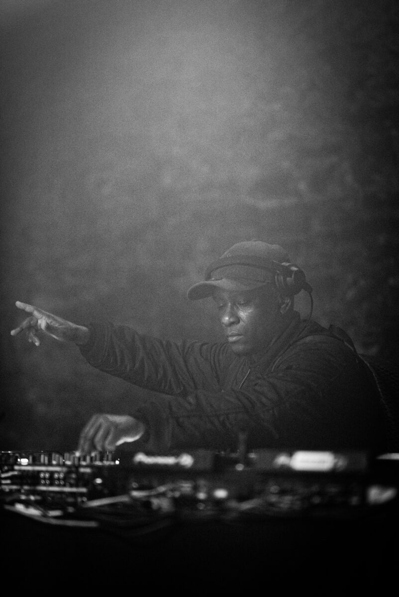 An image of Scratchclart DJing at the 'Diaspora' event at Loco Klub. The image is greyscale.